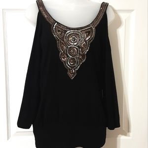 Cache long sleeve cold shoulder top with sequins and beads along neckline.